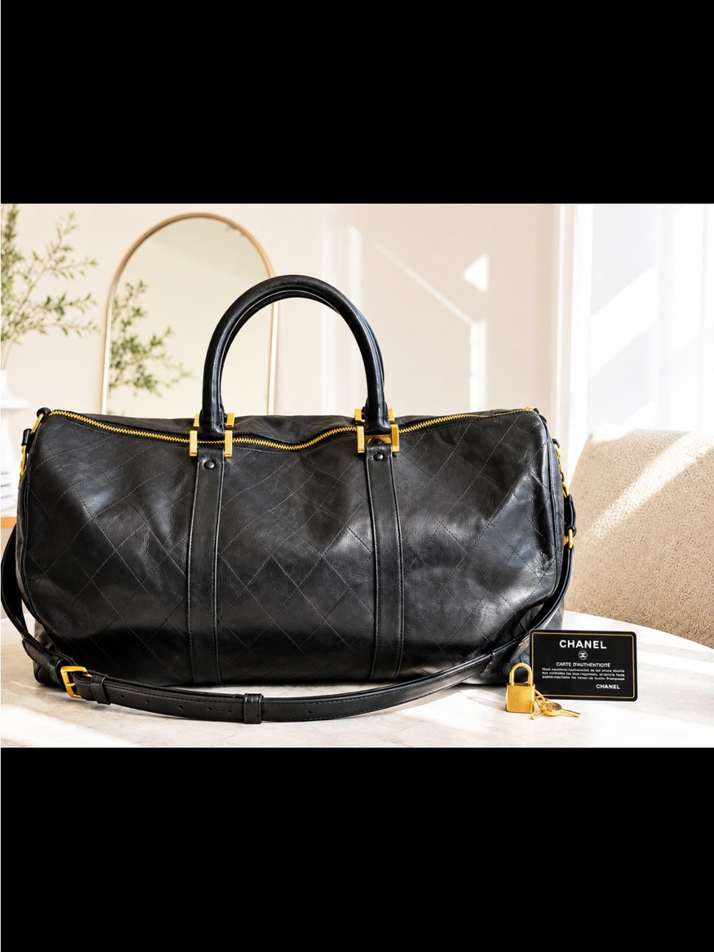 Chanel Quilted Leather Boston Duffel Bag with adjustable strap with Gold Hardwar